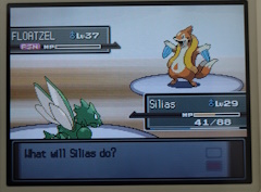 A battle. On the left is a scyther. his name is 'Silias', he has 41 out of 88 health points. On the right is a floatzel, it is currently poisoned, and has very little of its health points left. There is a textbox at the bottom, it says 'What will Silias do?'